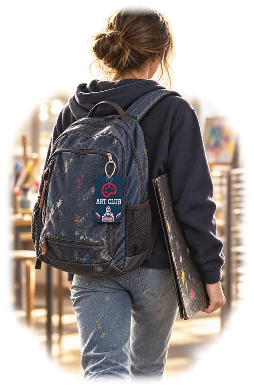An art-club student returning for a portfolio bag carrying a South Pier art tag