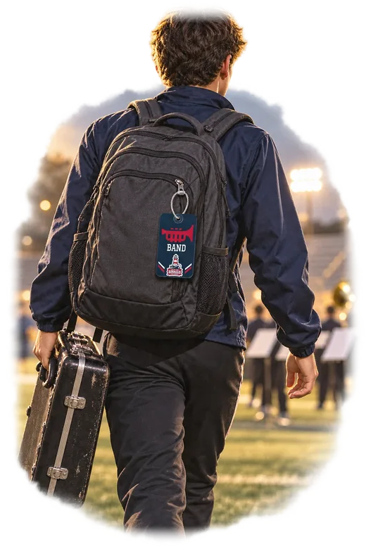 A marching-band student carrying an instrument case with a South Pier band tag